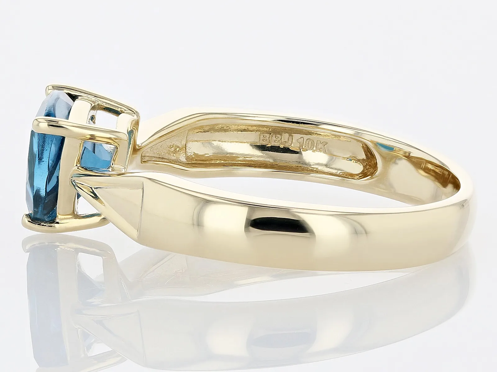 Regal Elegance: Trillion London Blue Topaz 10k Yellow Gold Ring ...