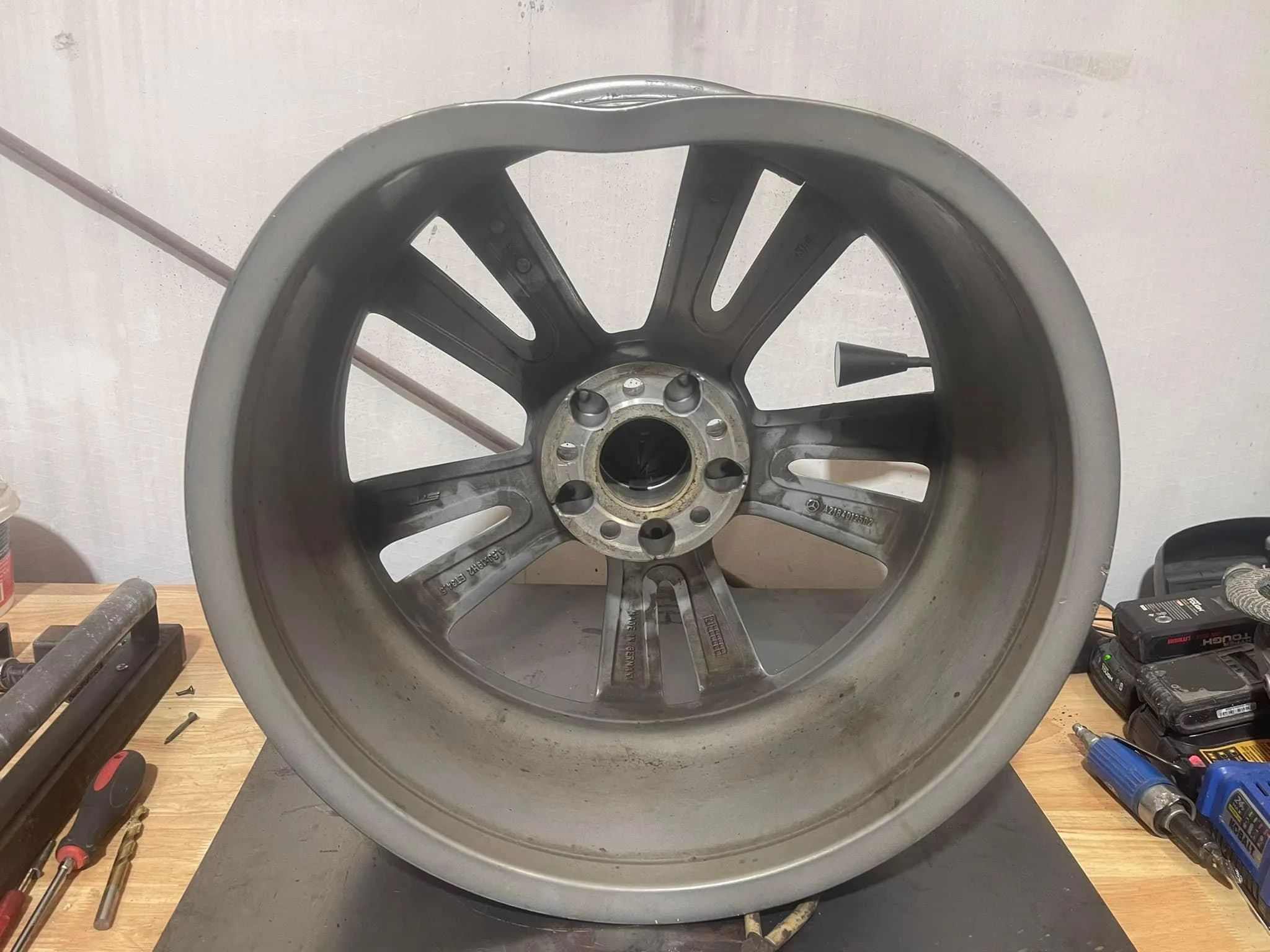 Bent rim before straightening Raleigh NC