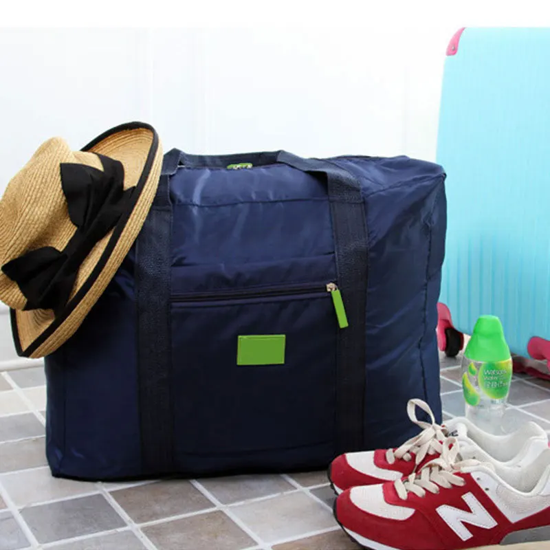 Wholesale low cost foldable versatile waterproof nylon luggage travel storage bag on sale