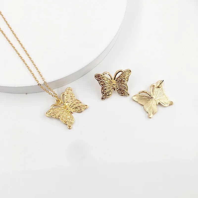 gold butterfly necklace and earring set