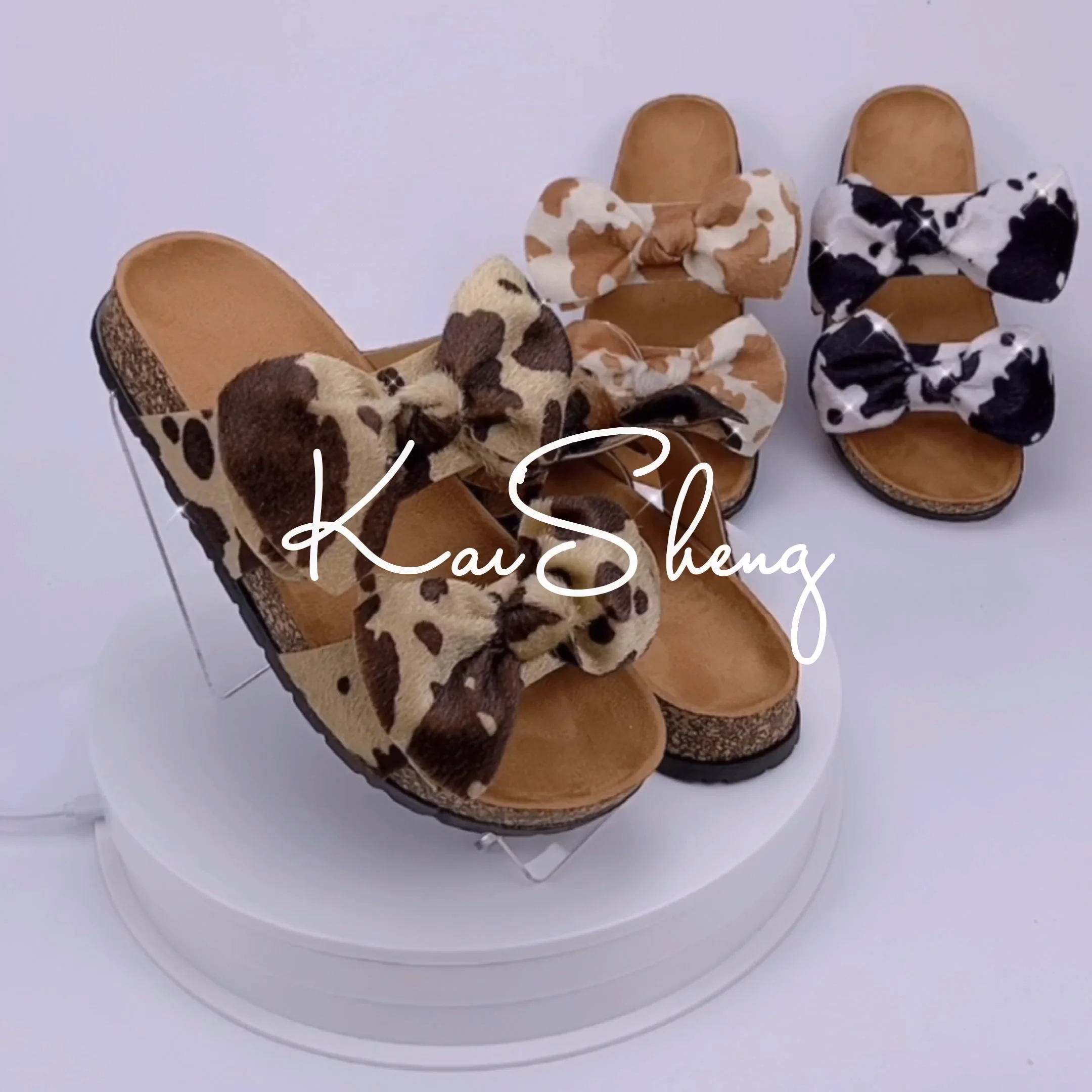 cow print double bow sandals