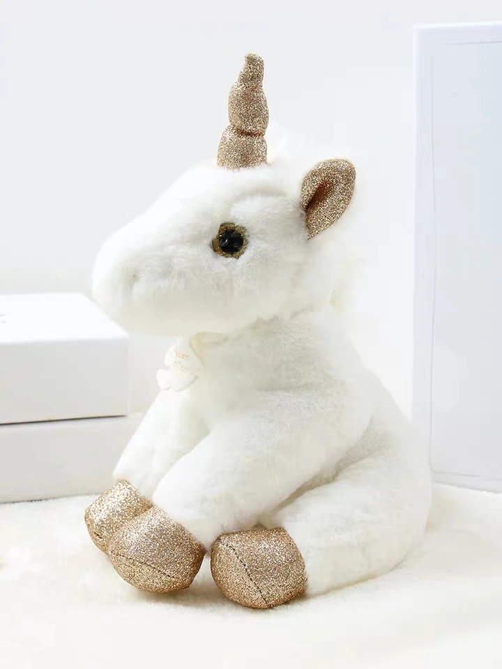 large white unicorn stuffed animal