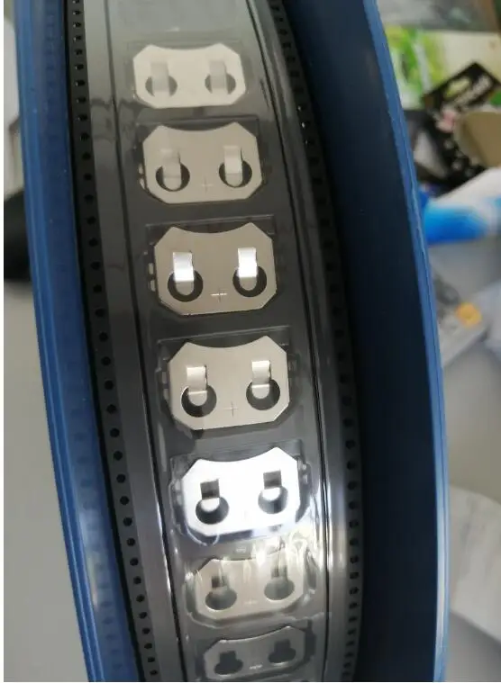 CR2032 holder in reel