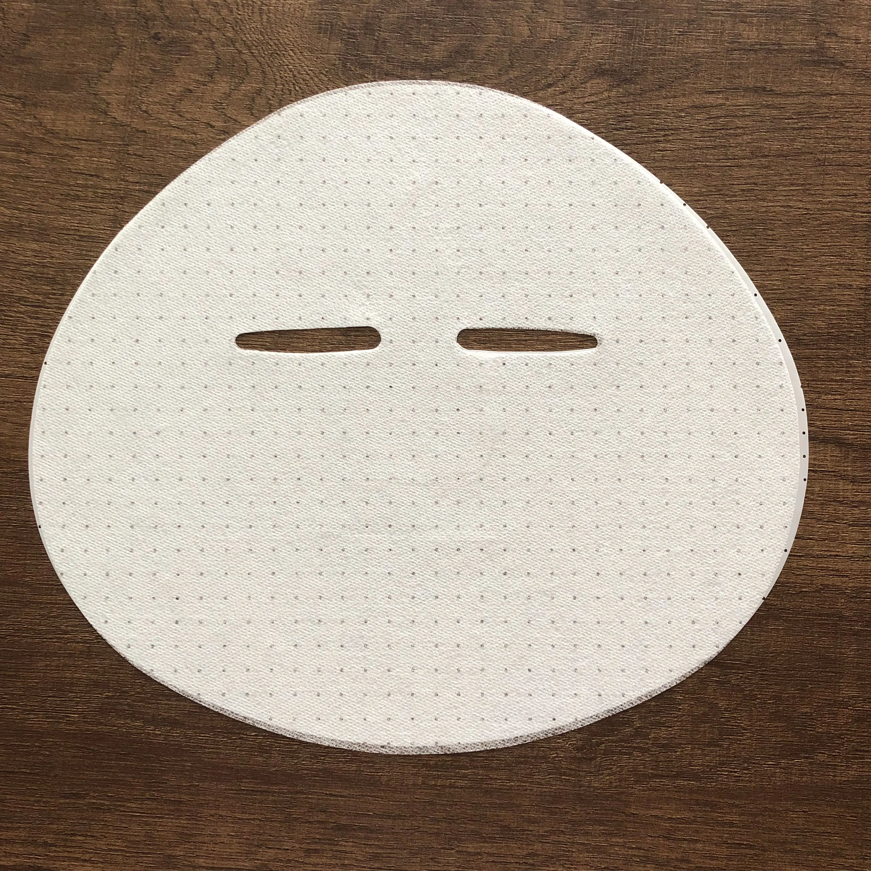 延安tc-fk25-25 廉价oem无纺纸 100% 天丝美容面膜在中国销售