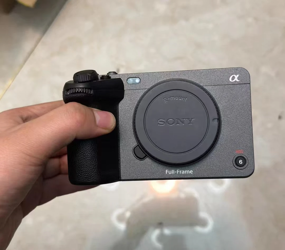 Professional 4K digital movie camera mounted on a gimbal with external monitor and microphone