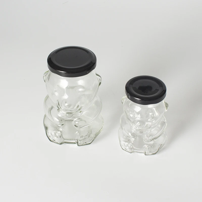 CLEAR GLASS BEAR-SHAPED JAR WITH METAL LID MADE IN GERMANY 