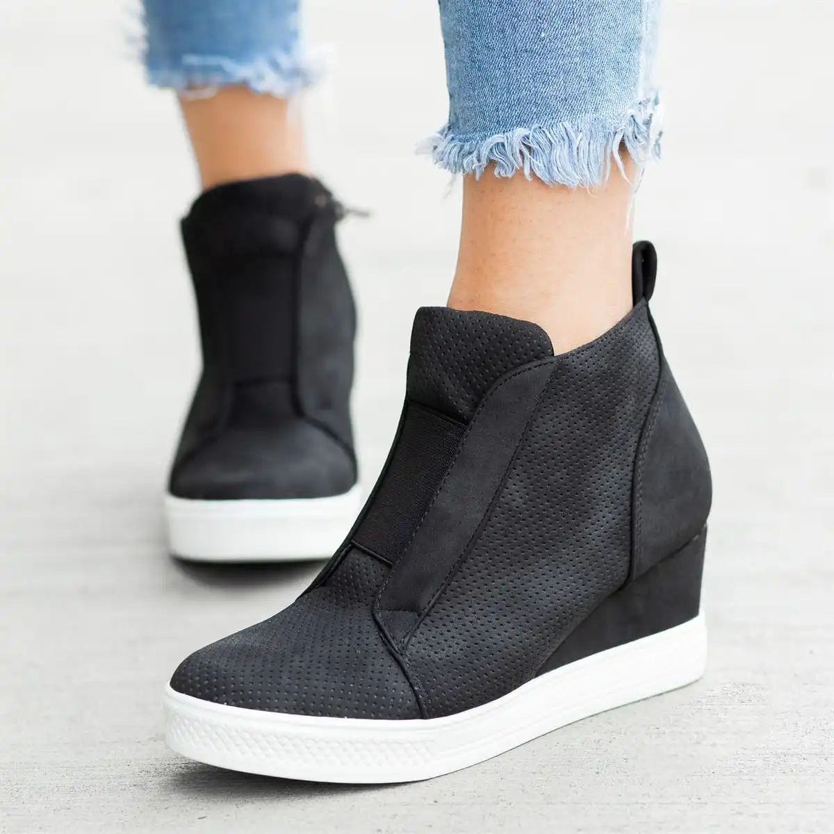 black hidden heel trainers