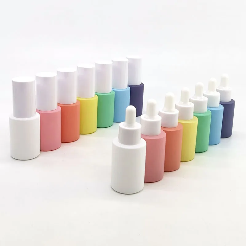 Wholesale 30 Ml 7 Color Glass Bottle With White Pump For Essential Oil
