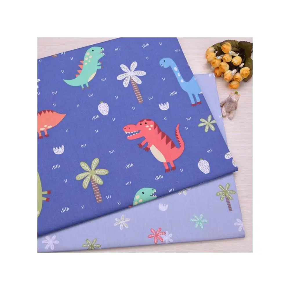 Dinosaurio de dibujos animados de sarga de algodón de tela impresa Eco-amigable y transpirable Textiles DIY para coser ropa de cama bebé artesanía
