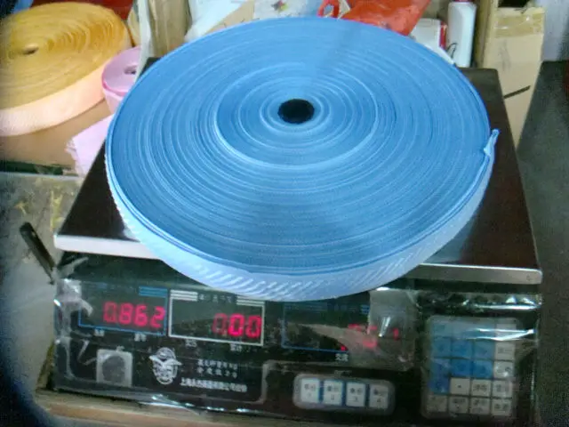 Weighing the mattress tape.JPG