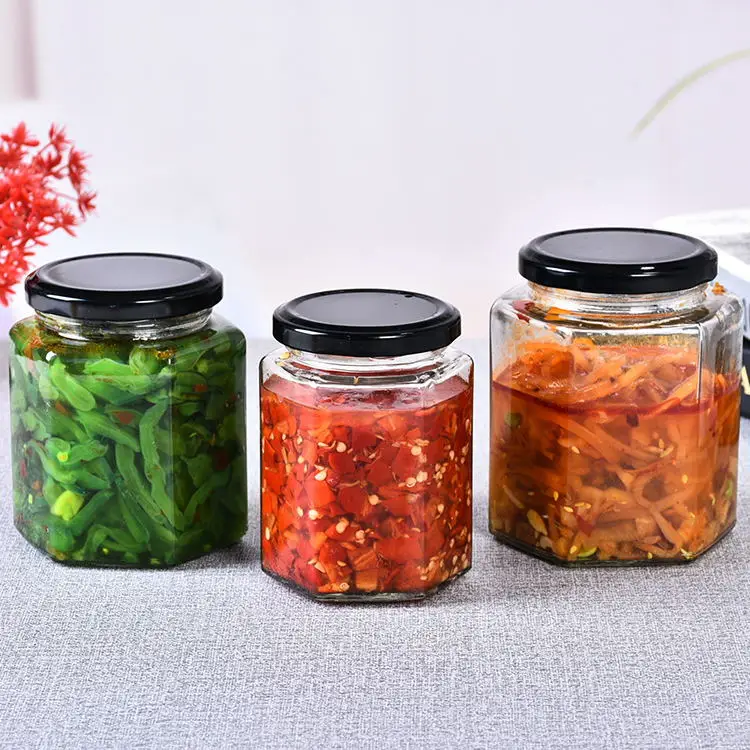 Wholesale Six edge glass bottle pickle Honey jar sealed spiral glass jar factory