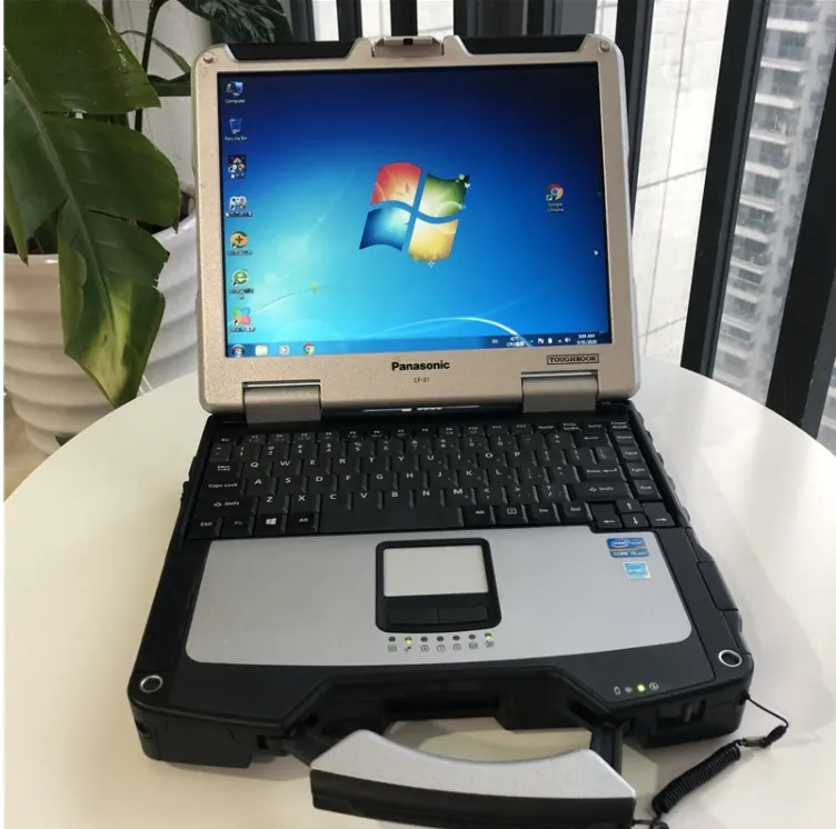 Laptop being tested on thermal chamber with temperature readout overlay