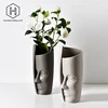 Abstract human face art ceramic vase arrangement with flower and wake flower design with Nordic style ceramic china vase