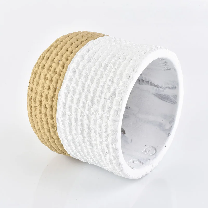 Matte white amber concrete candle jars with woven designs