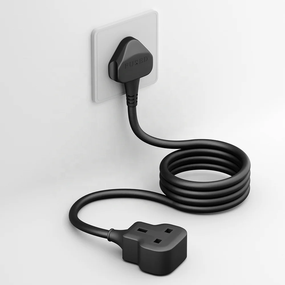 Close-up of a black 1m single socket extension lead showing fused 13A plug, flexible cable, and recessed socket