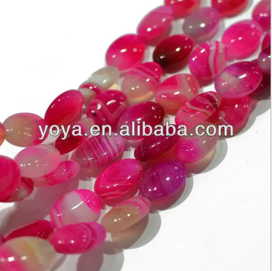 Natural peach pink stripe agate oval beads.jpg