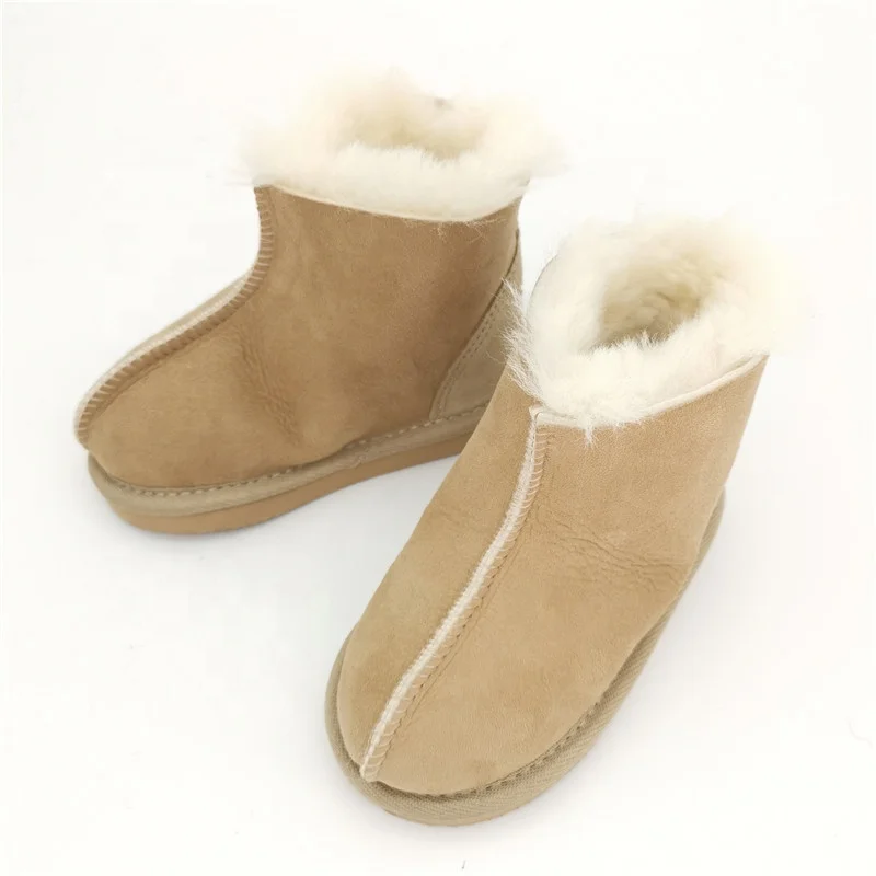 
HQS-KS001 OEM customized premium quality winter thermal genuine sheepskin slippers for children. 