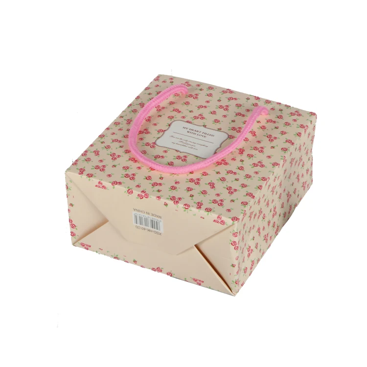 Pink eco friendly luxury paper packing bag for gift jewelry with ribbon handle