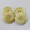 4 hole flat rim edge engraved bone button