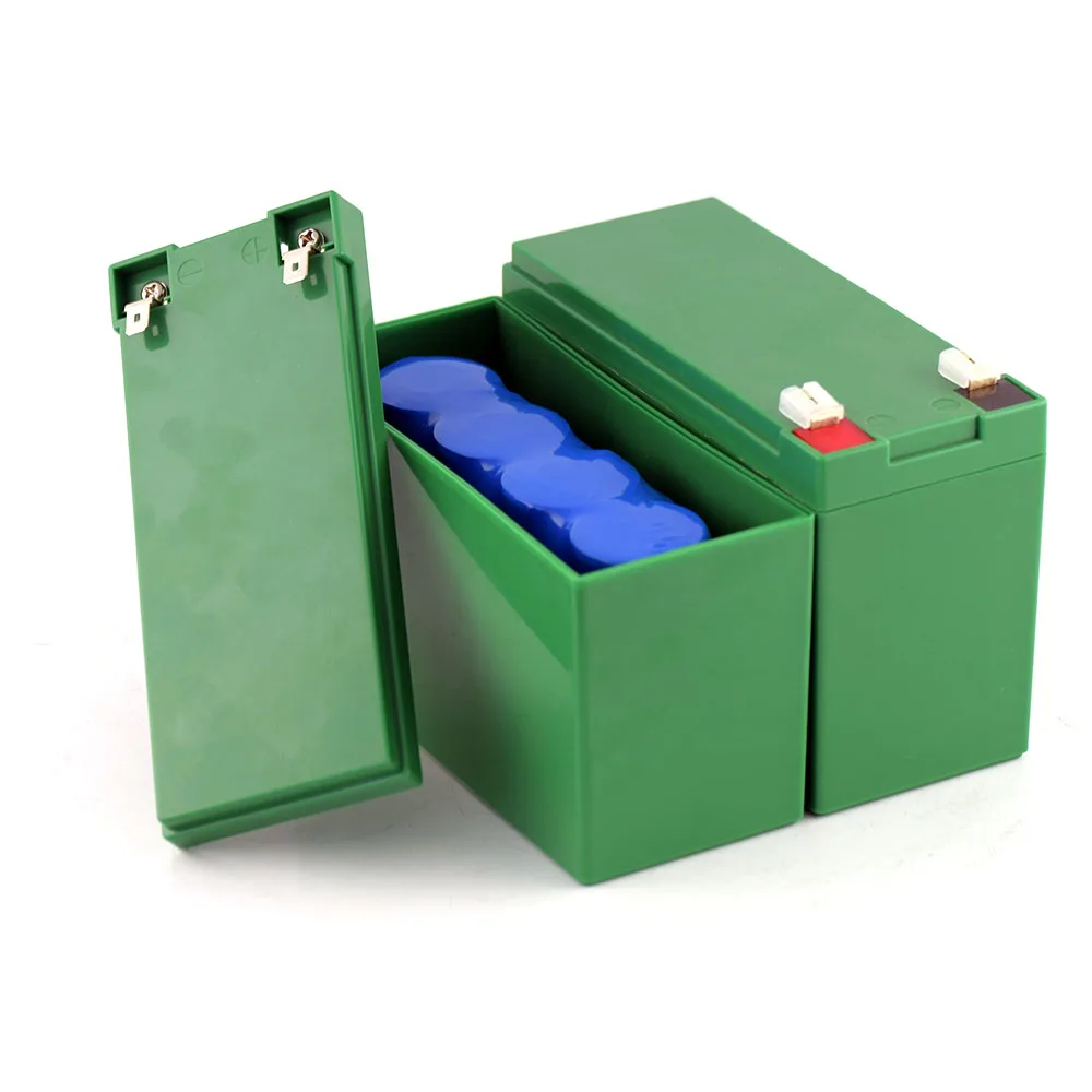 Close-up of LiFePO4 battery with visible BMS board and terminal labels