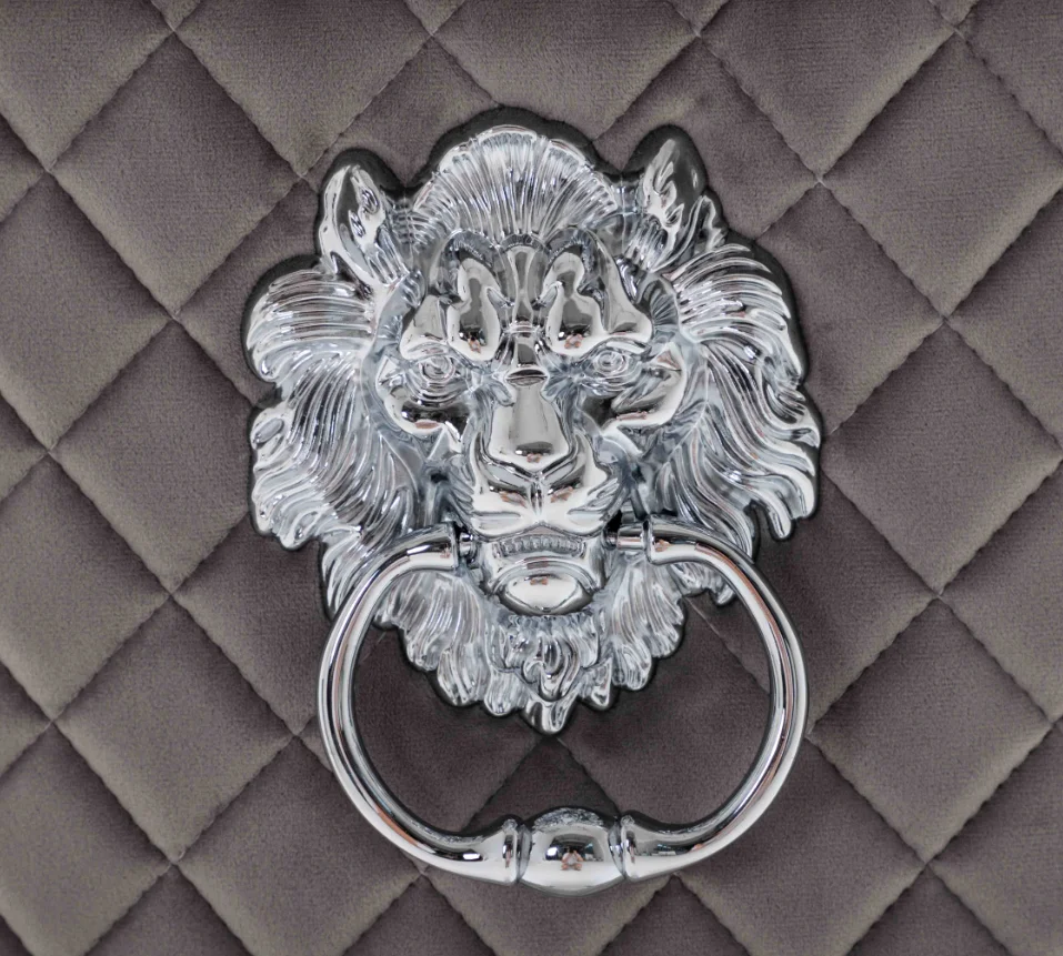 Cream dining chair with lion knocker