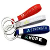 /product-detail/-12-pack-dream-achieve-strength-hope-inspirational-keychains-wholesale-silicone-rubber-key-rings-with-motivational-62391017373.html