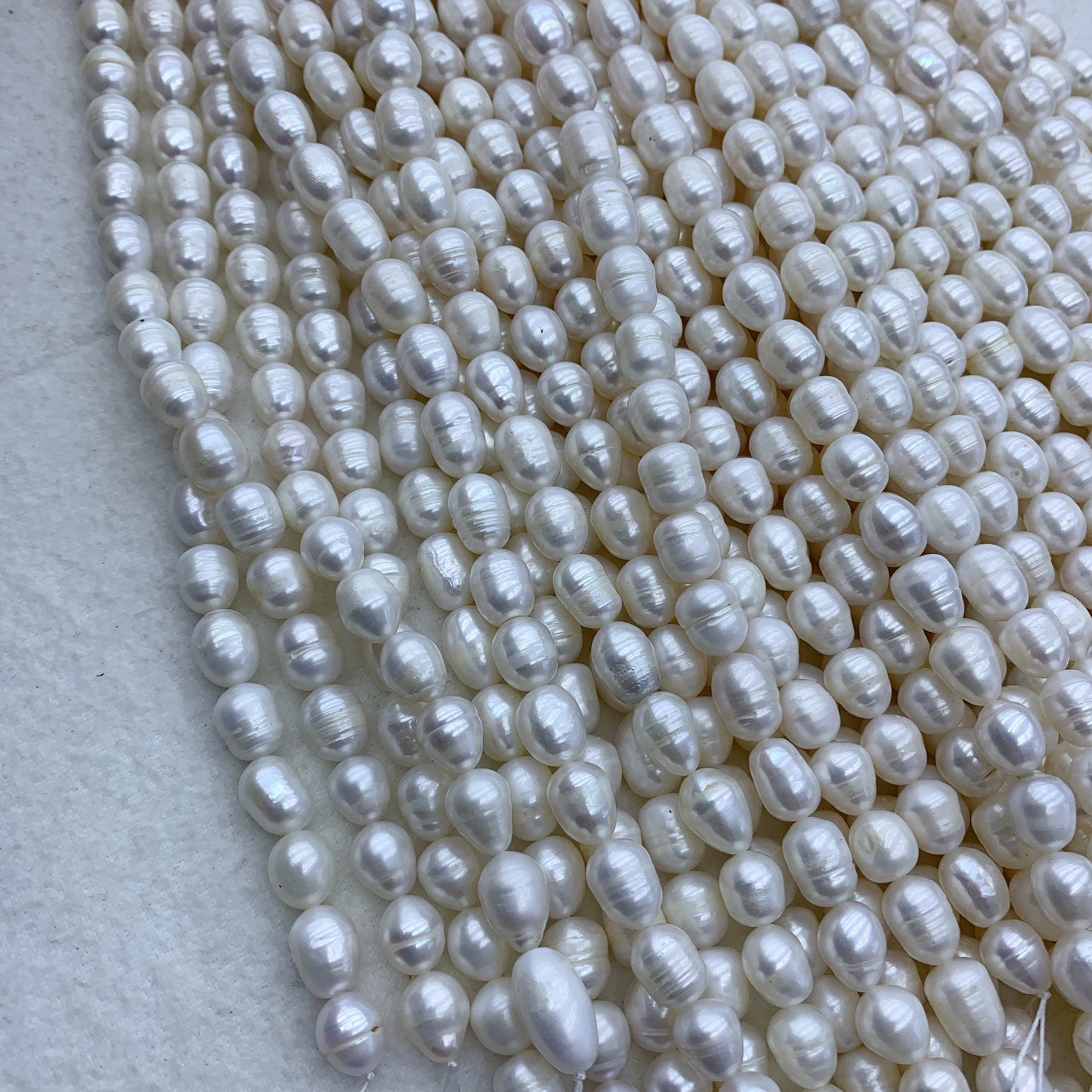 wholesale 4 strands 10mm freshwater pearl strings natural color 