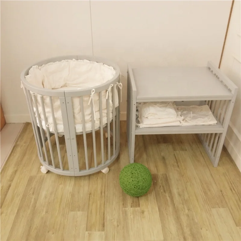 round wooden cot