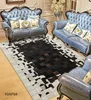 Black and White Patchwork Cowhide Rug