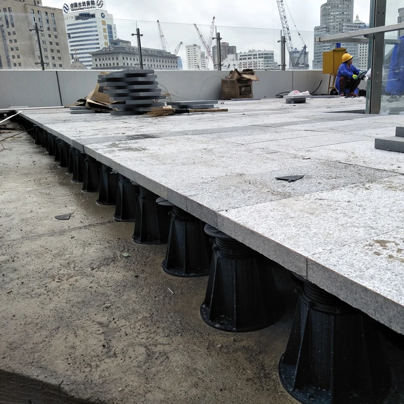 Height adjustable deck joist support pedestal