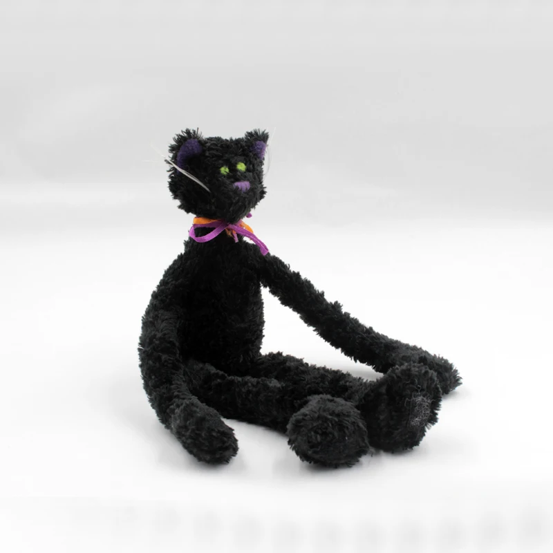 gatos negros de peluche