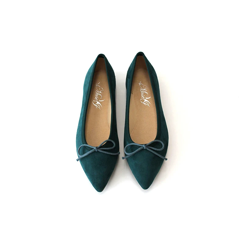 green flat pumps