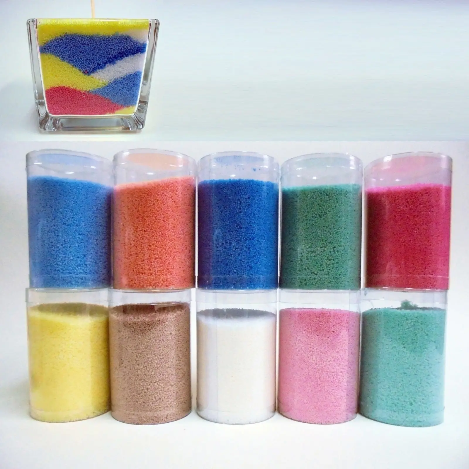 Young children making fun colorful layered granulated wax candles
