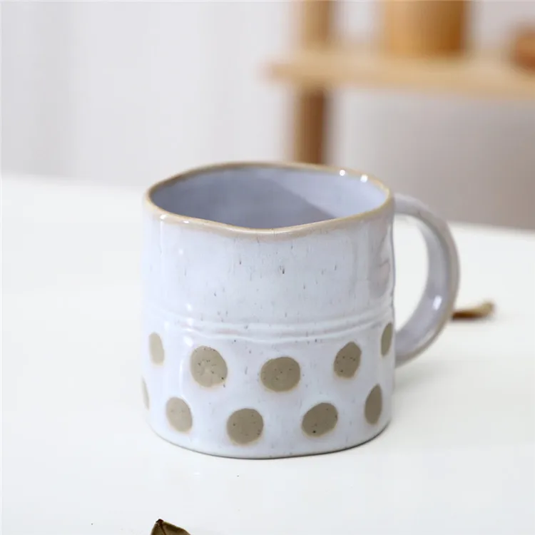 Wholesale exquisite ceramic mug stripe point relief hotel breakfast tea milk coffee porcelain mug with custom logo.jpg