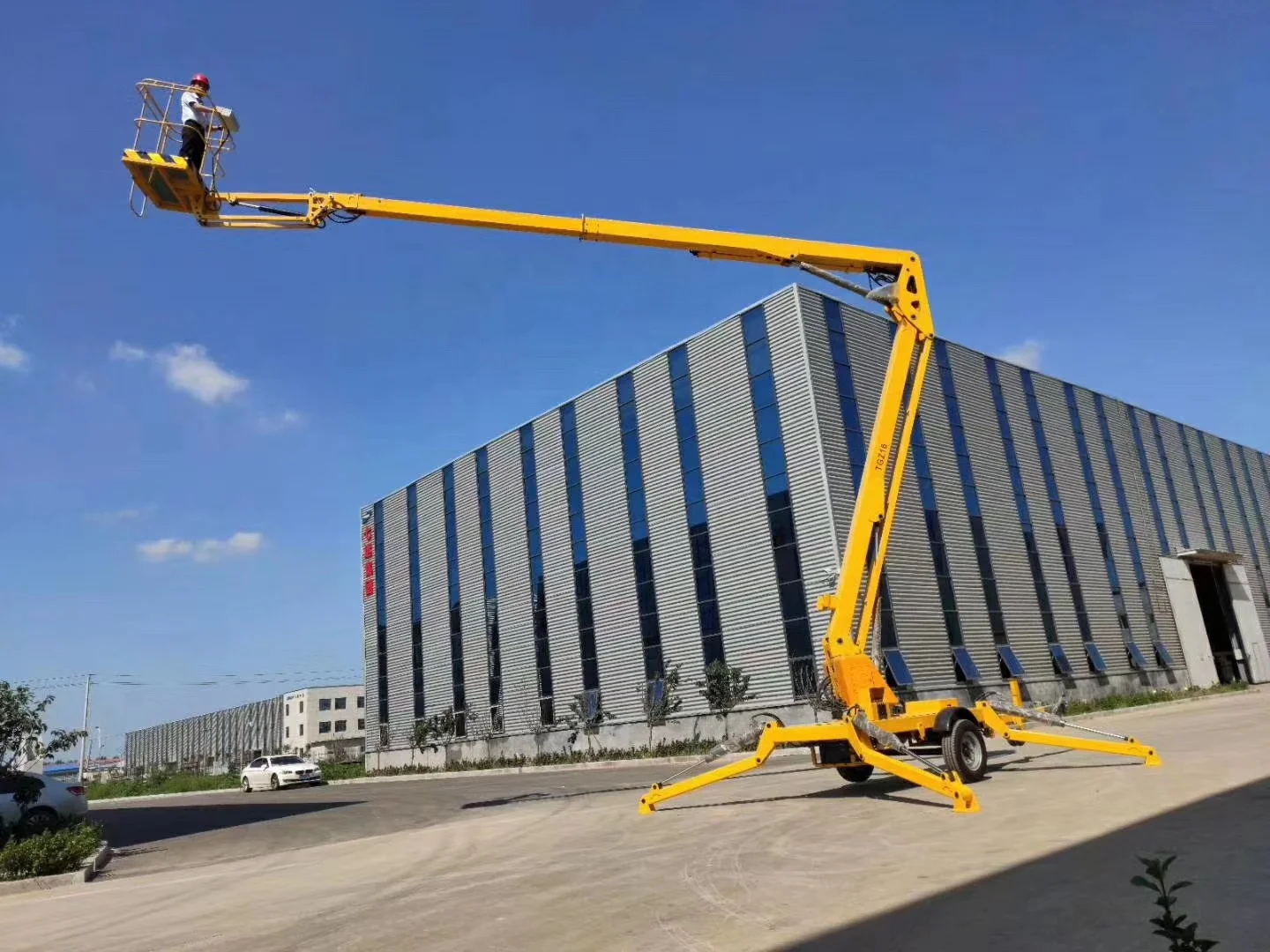 china cherry picker spider lift man boom lift aerial work platform trailer mounted articulating telescopic towable boom lift
