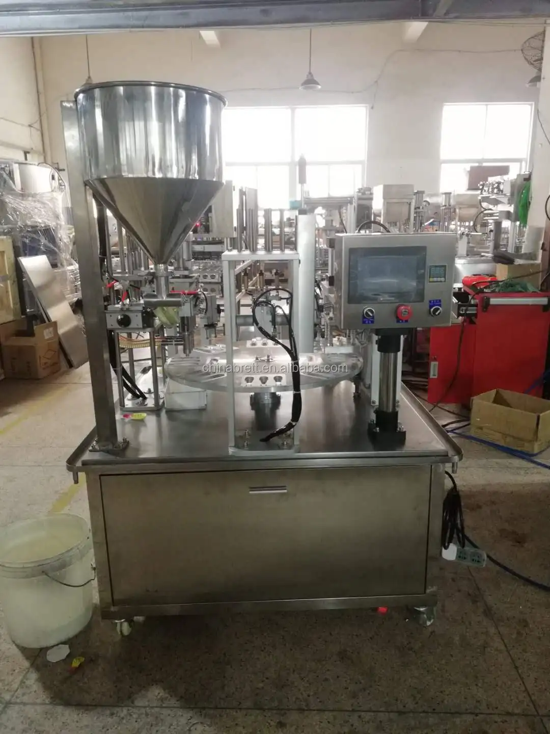 Small manual honey spoon filling machine cream packing machine
