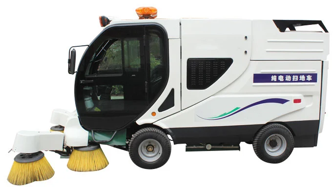 sweeper sweeping paper scraps and fallen leaves road sweeper