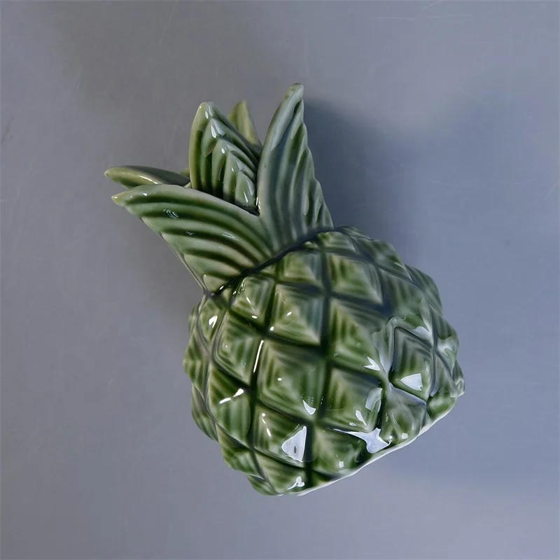 Pineapple-shape green Geo cut ceramic scented votive candle vessel custom candle holders with lid home decor wholesale