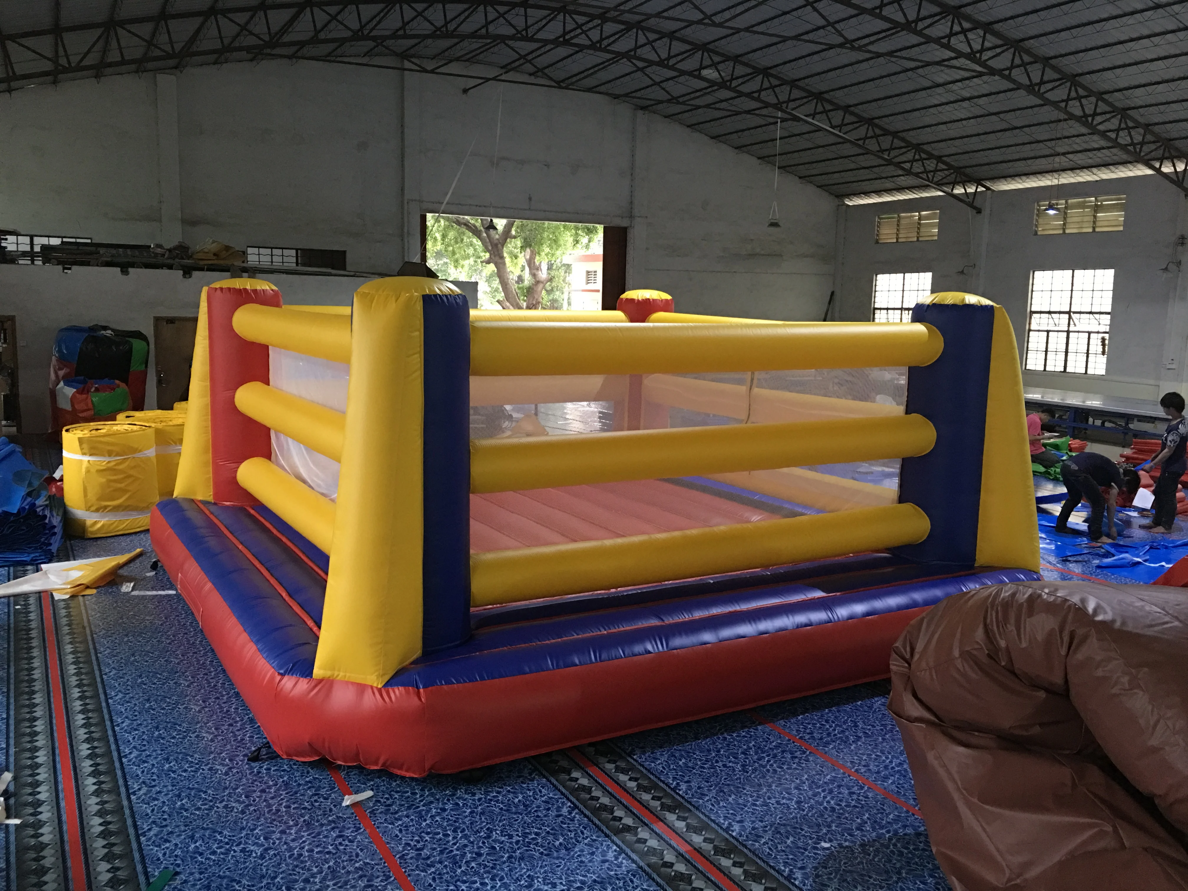 giant inflatable boxing ring arena with oversized boxing gloves