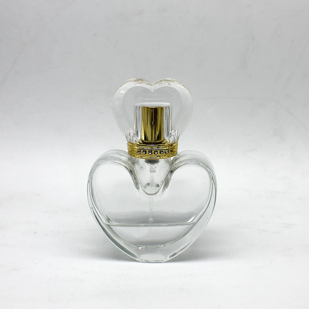 50毫升心脏形的透明玻璃香水瓶与盖