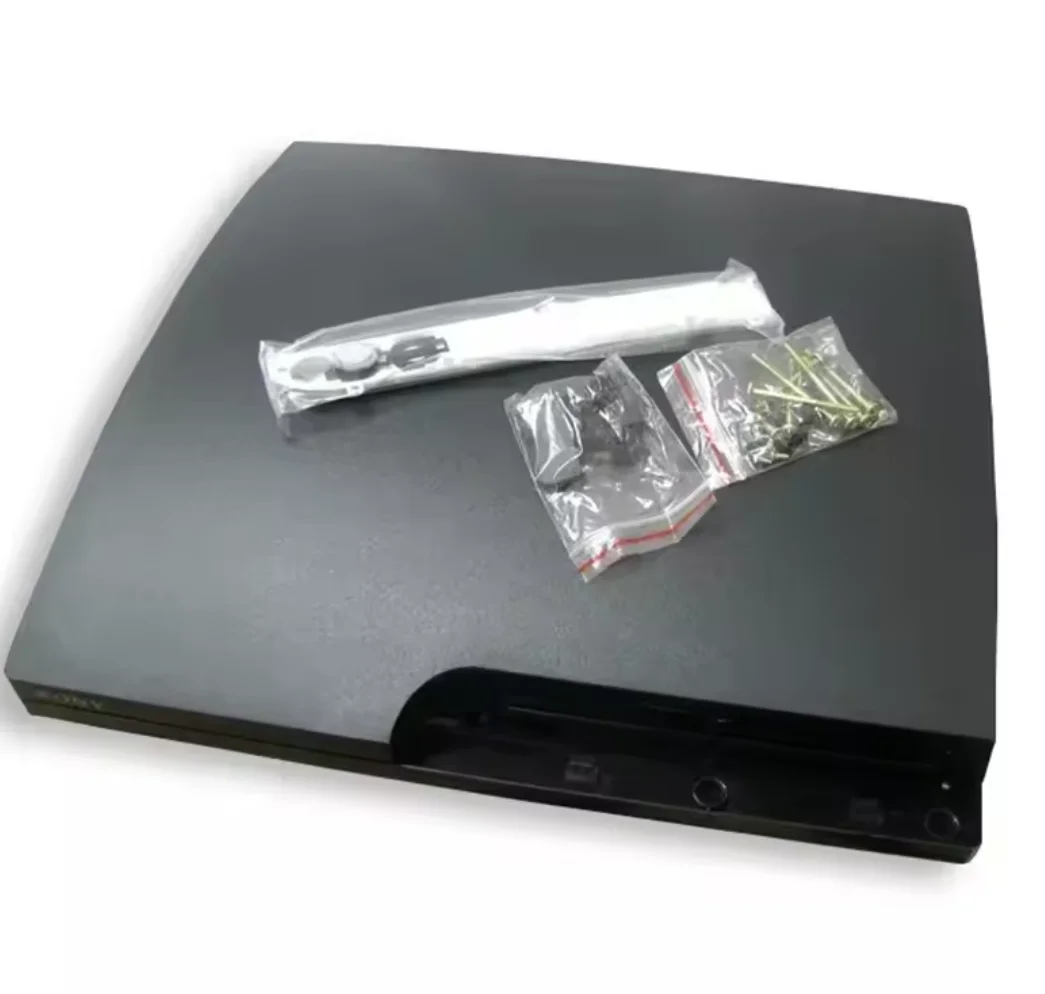 Side-by-side PS3 Slim shell comparison showing original (yellowed) vs. replacement (matte black) with identical vent pattern and screw placement