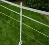 Round plastic fencing posts keep cows in and wildlife out