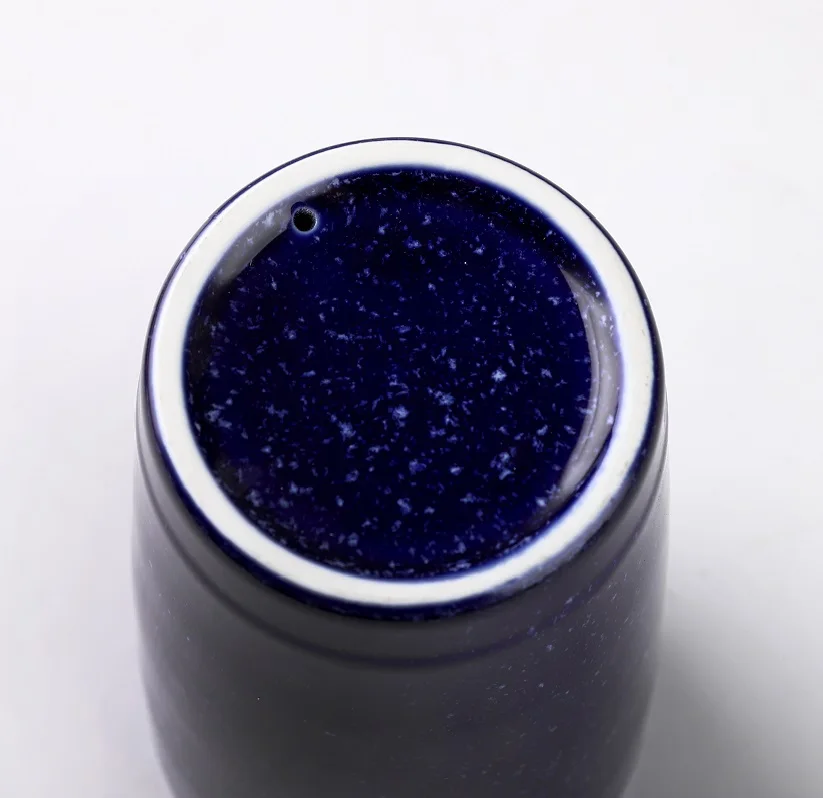 TRAVEL MUG BOTTOM.jpg