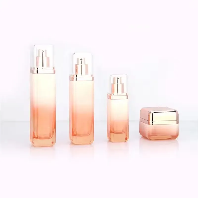 Supplier Cosmetic square glass bottle set Innovative design of rose gold cover for skincare packaging 50g40ml100ml120ml factory