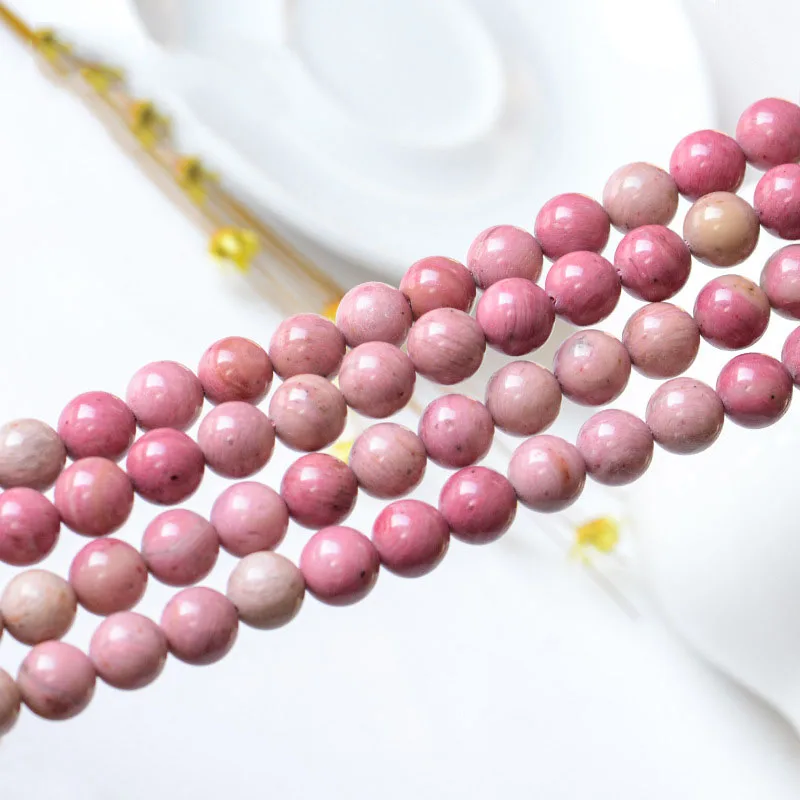 义乌批发天然红粒粉珠宽松菱锰矿石头圆珠