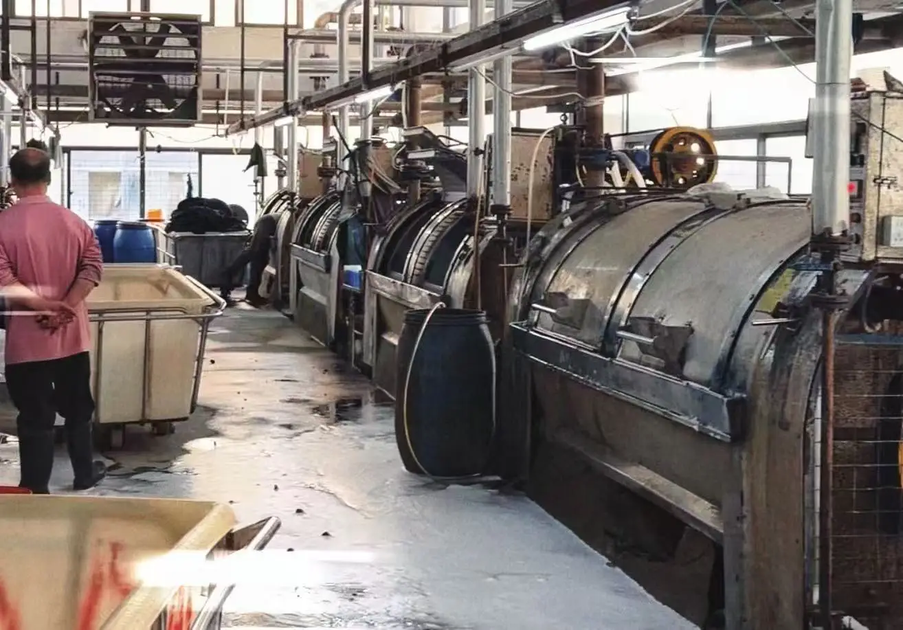 Precision stitching in our sewing workshop, ensuring durability and consistent construction.
