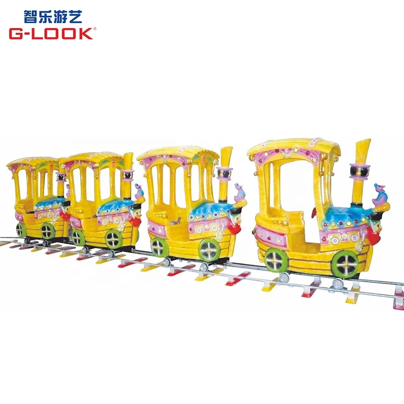 kids ride on train with track
