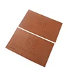 China Wholesale Garment Custom Name Debossed Logo Cheap Brown PU Leather Labels Patches for Denim