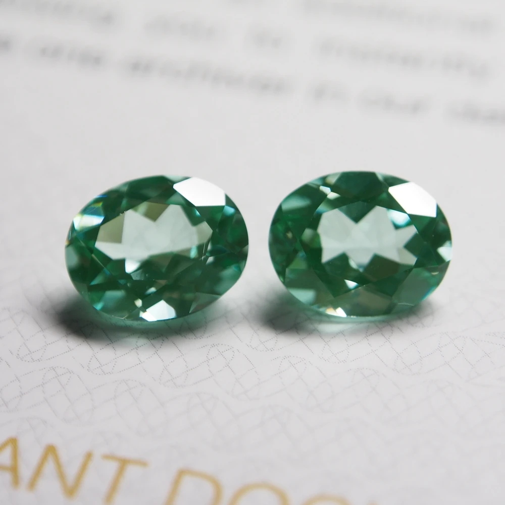 a pair of 6 mm Round Light Green created spinel 