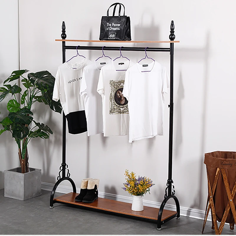 Golden Clothes Racks Can Be Raised Or Lowered Bask In Clothes Tree